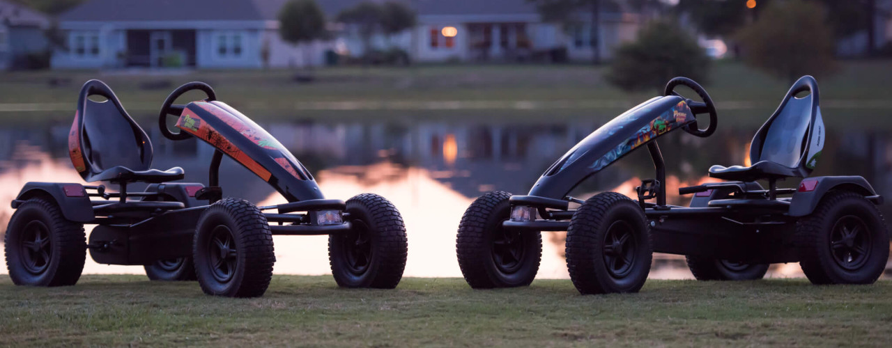 A couple pedal karts at the golden hour.